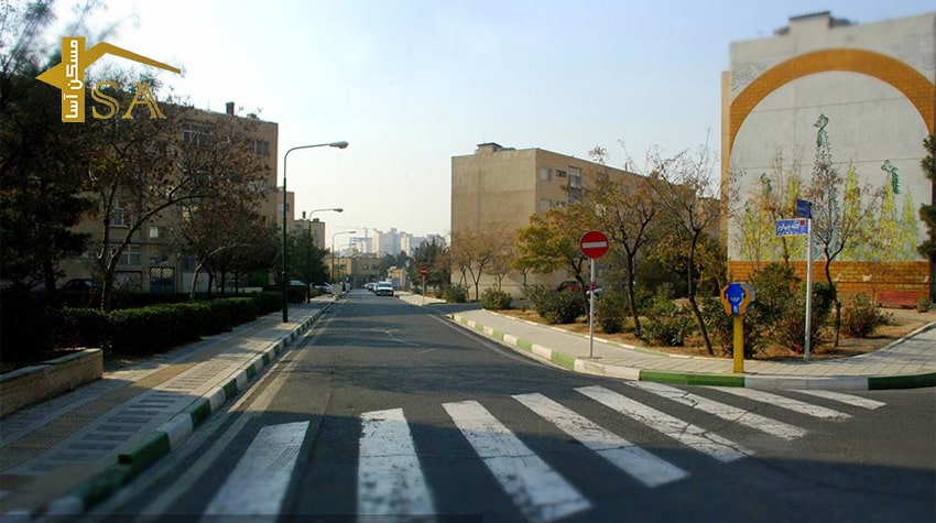 تقاطع خیابان لاله سوم و لاله چهارم شهرک لاله و نمای زیبای آپارتمان های مسکونی شهرک لاله دهکده المپیک